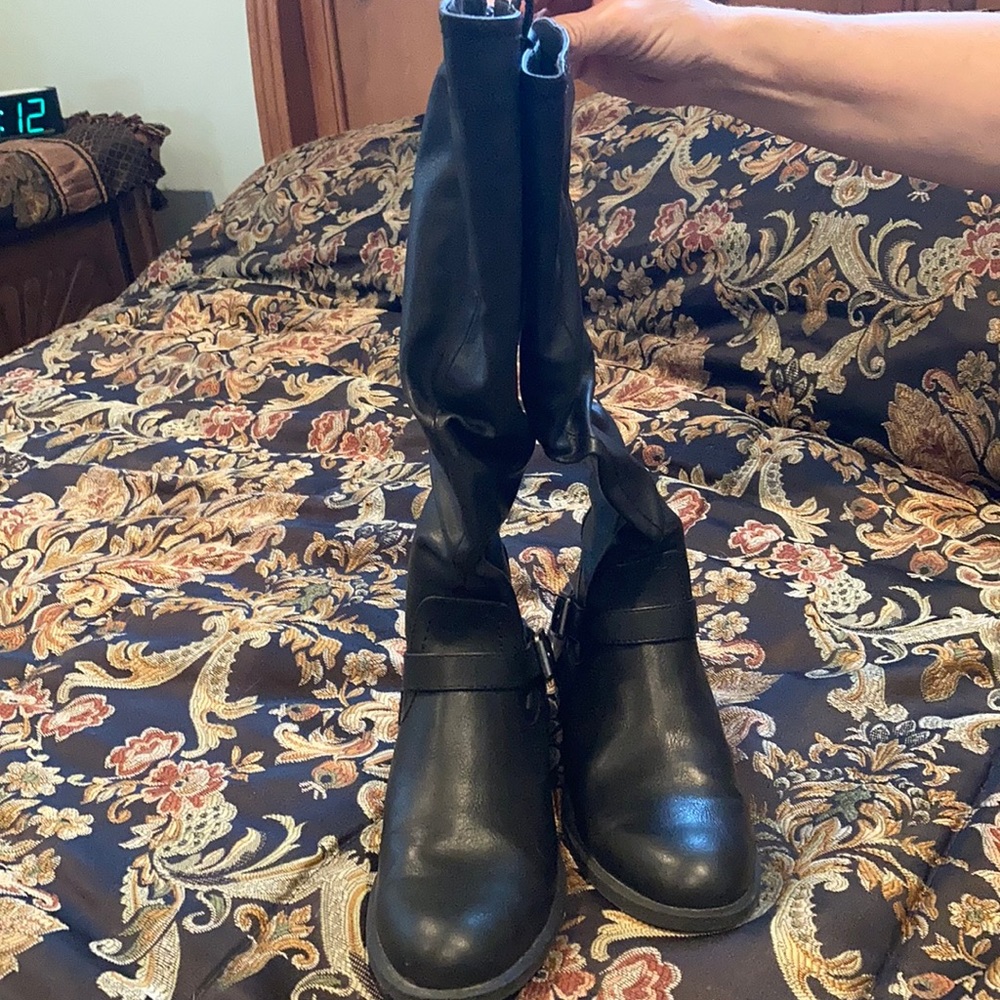 Black below the knee boots